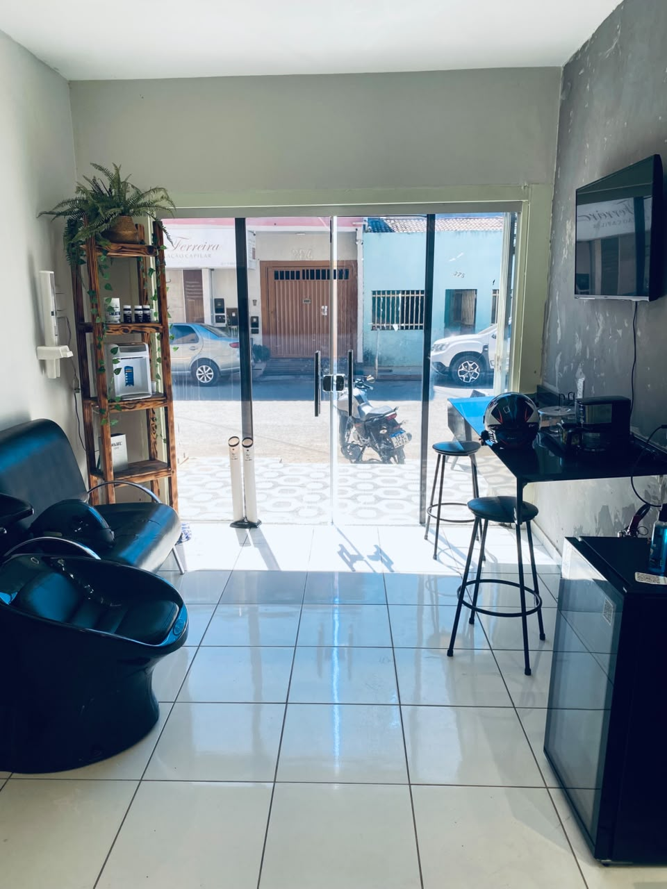 Fachada e recepção do estúdio